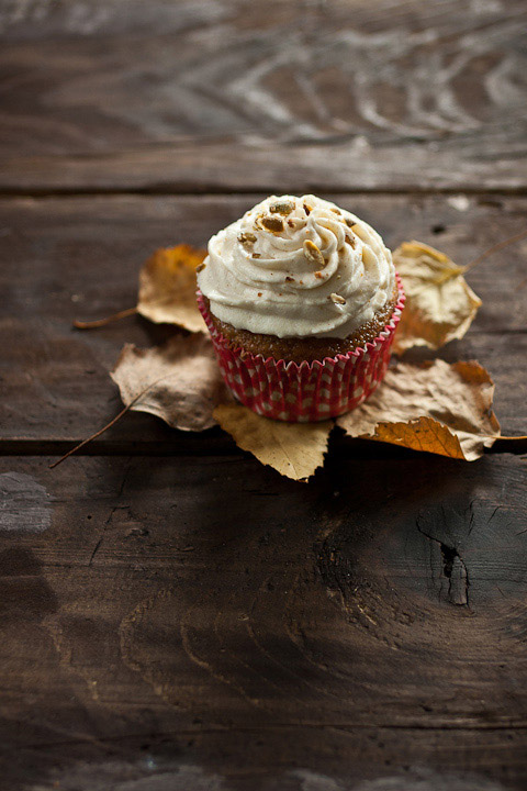 Pumpkin Cupcakes With Cinnamon Frosting And Candied Pepitas